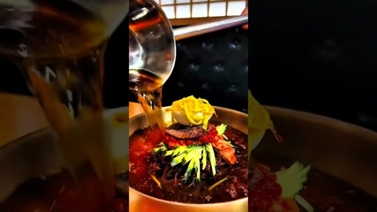 The cool Korean cold noodles and doubled cooked pork slices are a perfect match