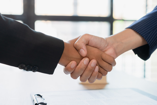 握手　契約